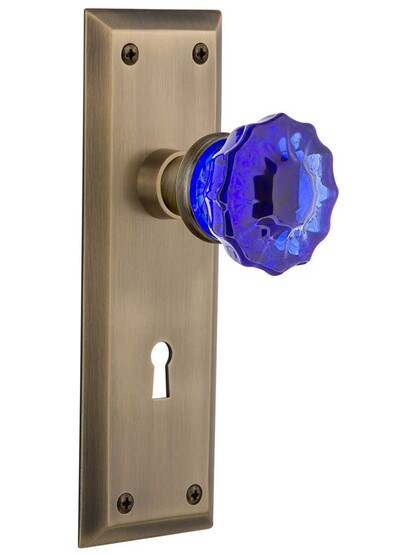 New York Door Set with Keyhole and Colored Fluted Crystal Glass Knobs Cobalt Blue in Antique Brass.